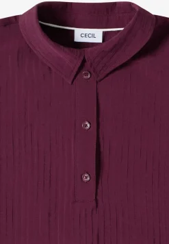 Blouse structurée à épaules tombantes