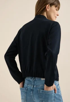 Blouson avec bandes scintillantes