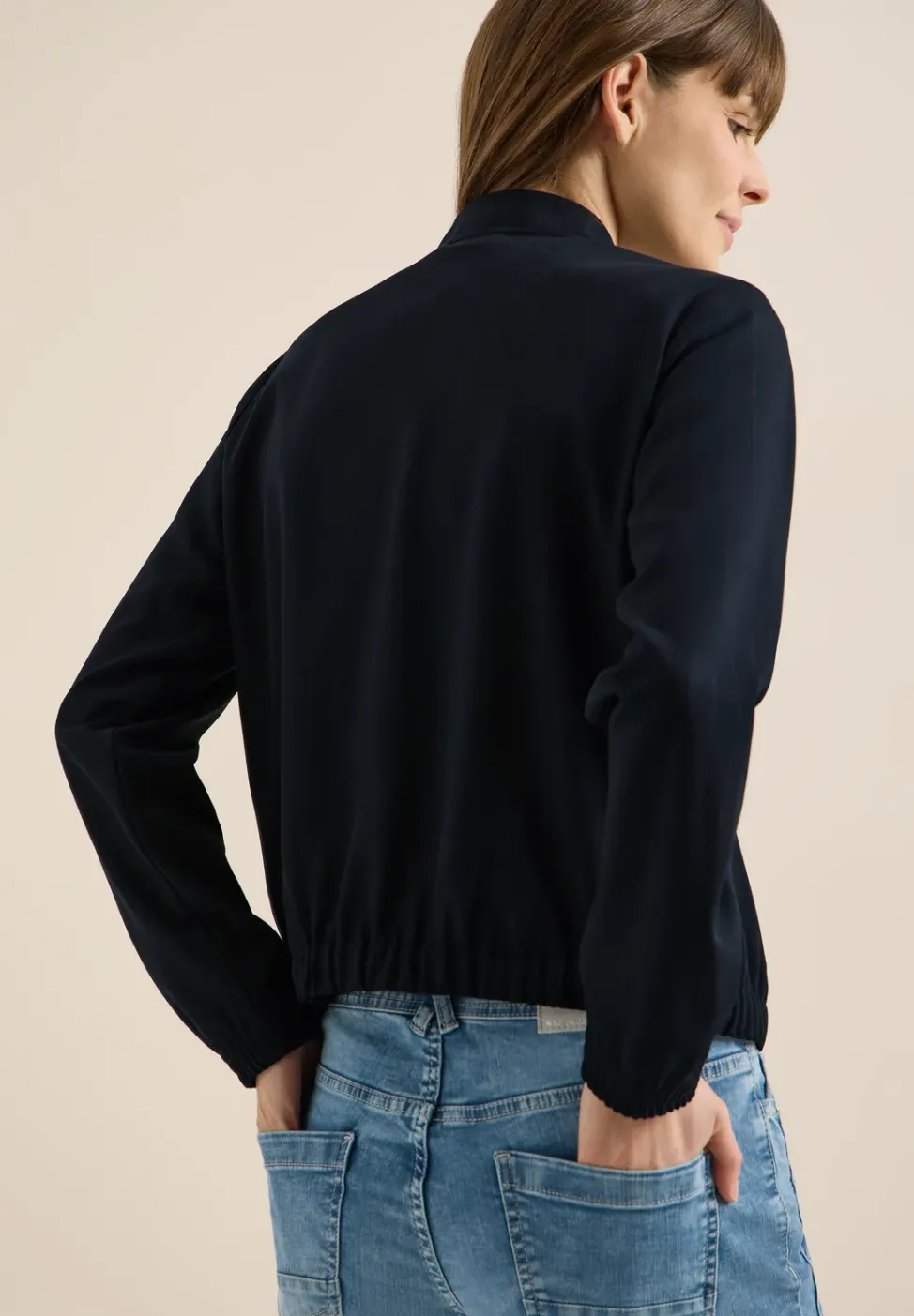 Blouson avec bandes scintillantes