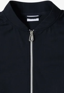 Blouson avec bandes scintillantes