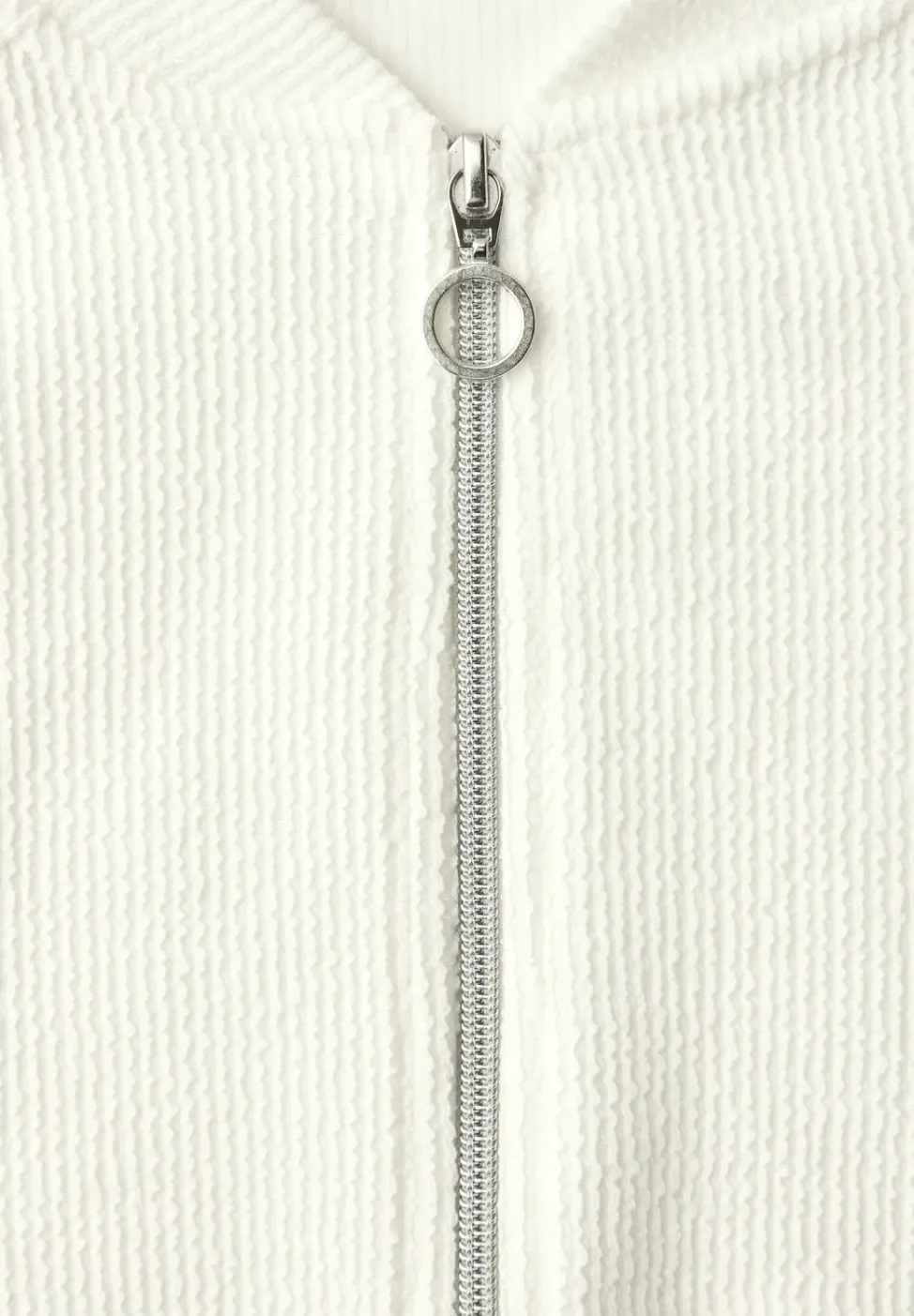 Blouson avec fermeture éclair et structure
