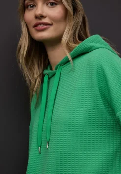 Chemise à capuche