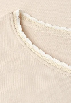 Chemise à épaules tombantes avec ruban décoratif