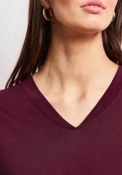 Chemise à épaules tombantes et col en V