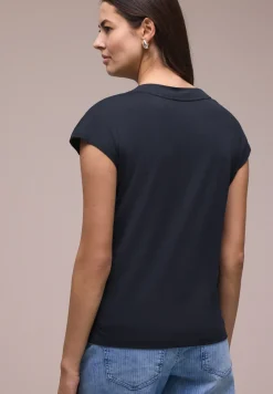 Chemise à épaules tombantes et col en V