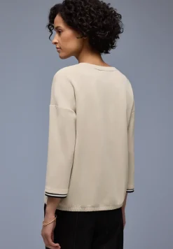Chemise effet soyeux avec détails subtils