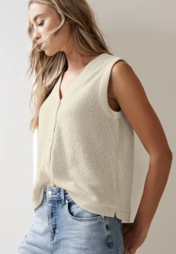 Gilet avec col en V dans un look tricoté