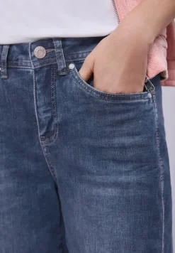 Jeans à jambes barrées