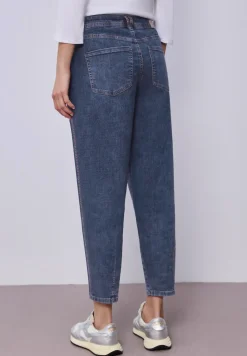 Jeans à jambes barrées