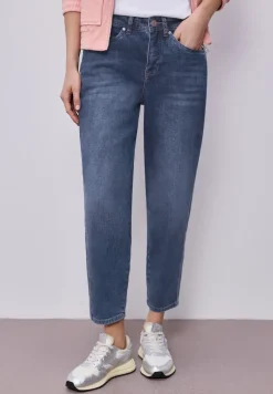 Jeans à jambes barrées