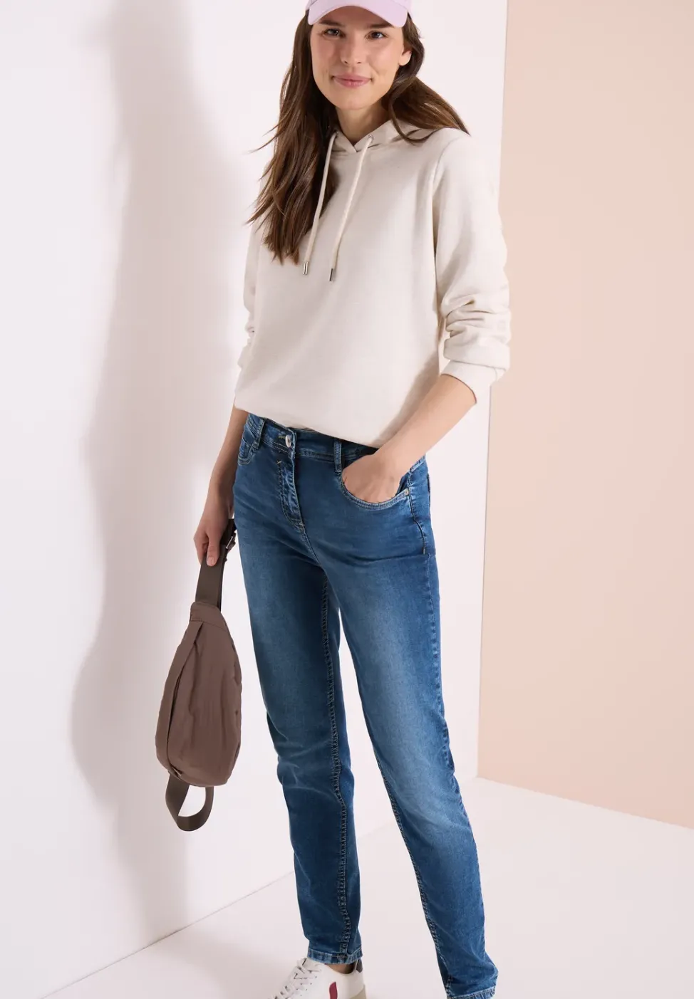 Jeans slim legs à taille haute et coupe ajustée