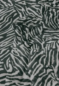 Jupe en mousseline de soie à motifs