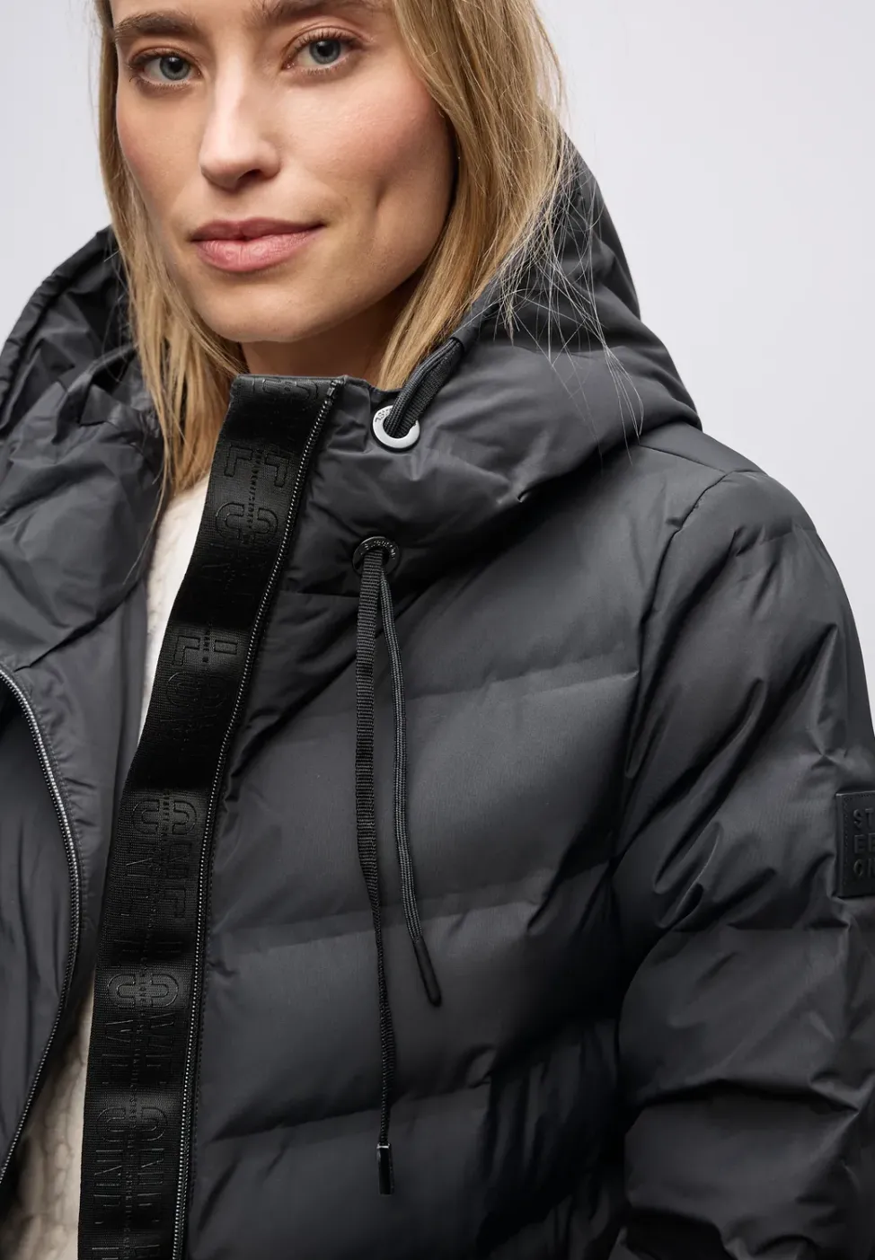 Manteau avec coutures collées