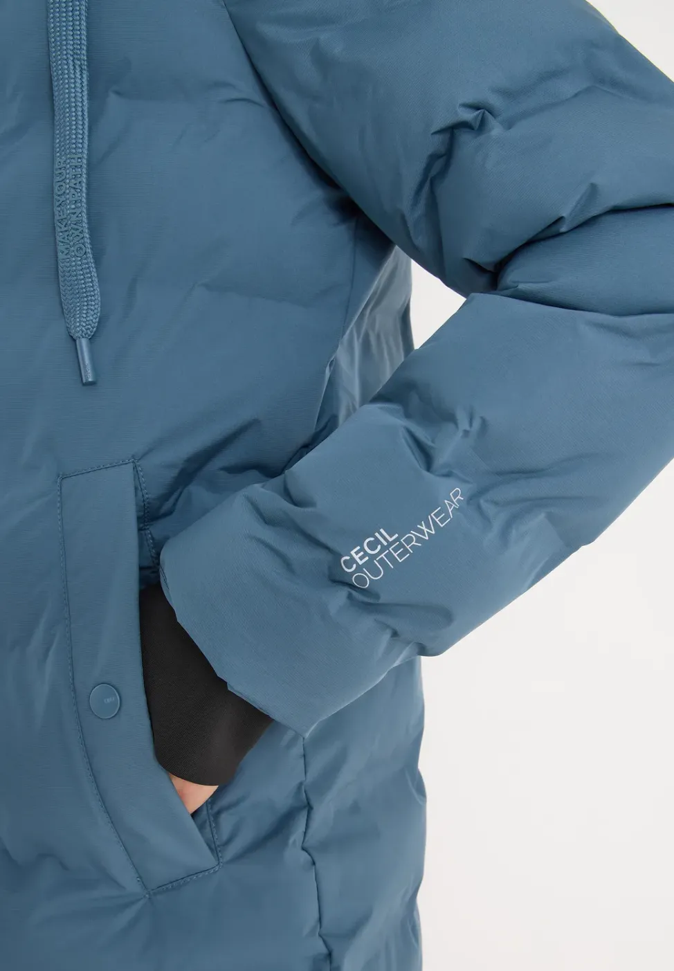 Manteau avec matelassage sans coutures