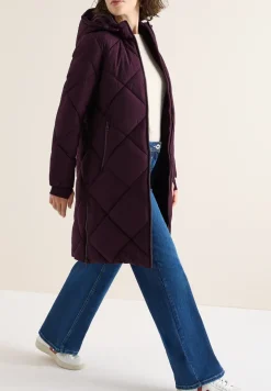 Manteau avec sac à dos Strings