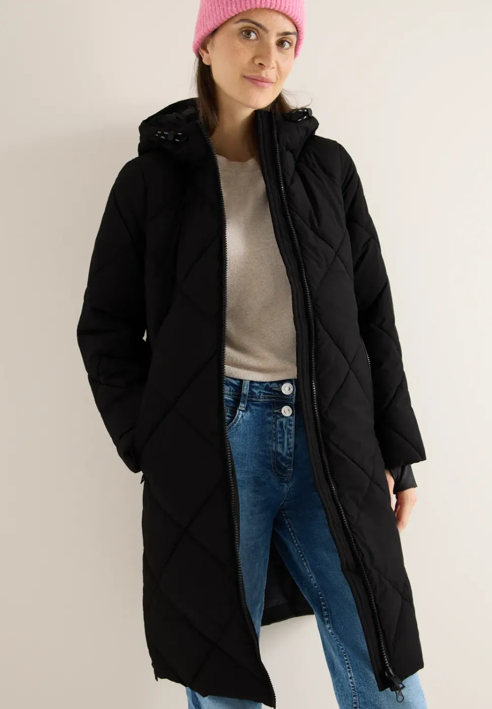 Manteau avec sac à dos Strings