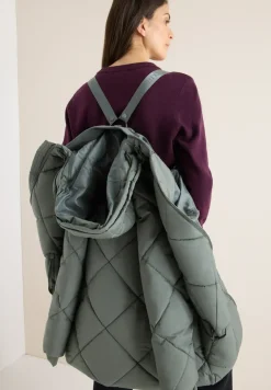 Manteau avec sac à dos Strings
