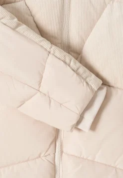 Manteau bouffant avec mélange de velours côtelé