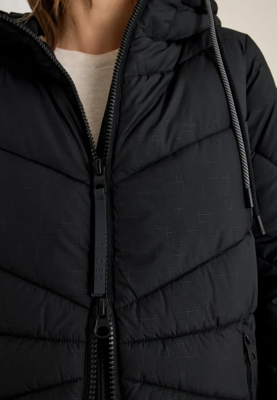Manteau matelassé avec capuche