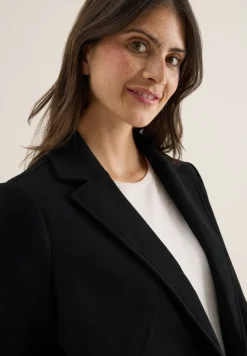 Manteau à revers aspect laine