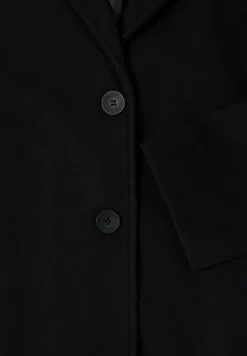 Manteau à revers aspect laine