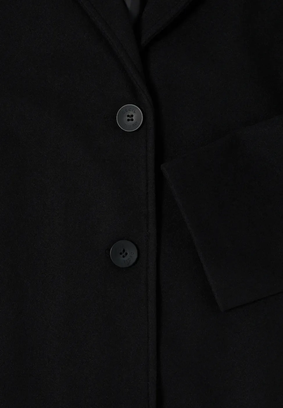 Manteau à revers aspect laine