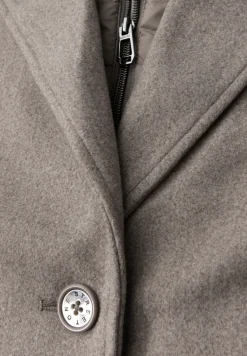 Manteau à revers avec incrustation