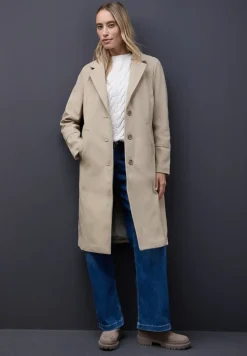 Manteau à revers avec incrustation
