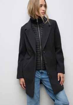 Manteau à revers avec incrustation