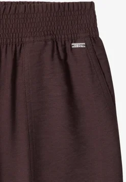 Pantalon Mid Waist Slim Leg en coupe loose