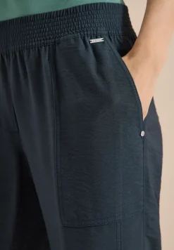 Pantalon Mid Waist Slim Leg en coupe loose