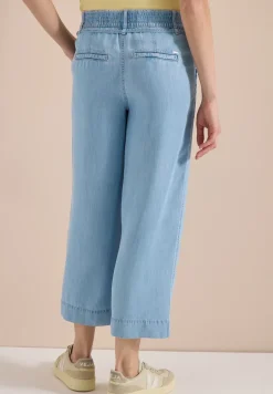 Pantalon taille haute à jambes larges, look délavé