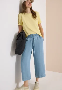 Pantalon taille haute à jambes larges, look délavé