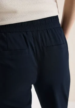 Pantalon taille mi-haute coupe slim