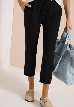 Pantalon taille mi-haute coupe slim