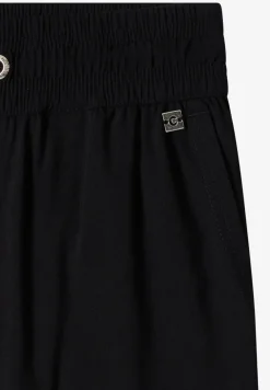 Pantalon taille mi-haute coupe slim