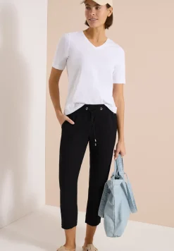 Pantalon taille mi-haute coupe slim