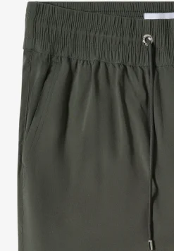 Pantalon taille mi-haute coupe slim