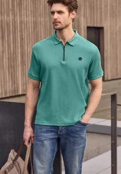 Polo zippé et structuré