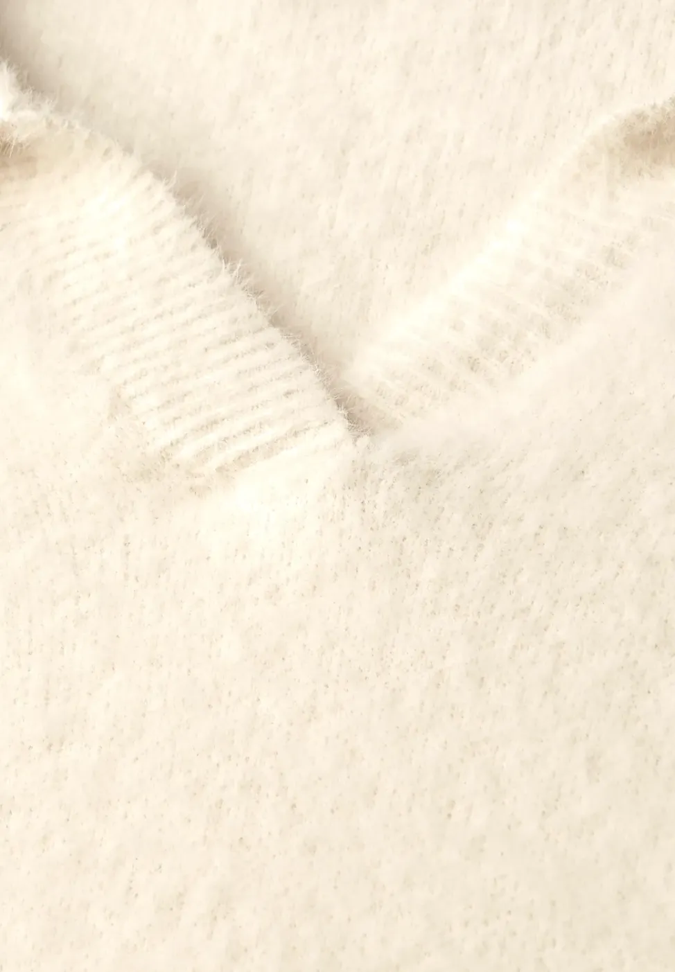 Pull en fil de plume