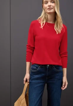 Pull avec détail de boutons