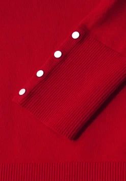 Pull avec détail de boutons