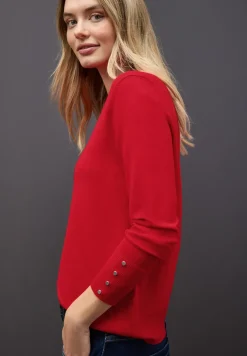 Pull avec détail de boutons