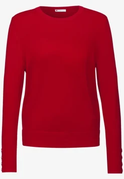 Pull avec détail de boutons
