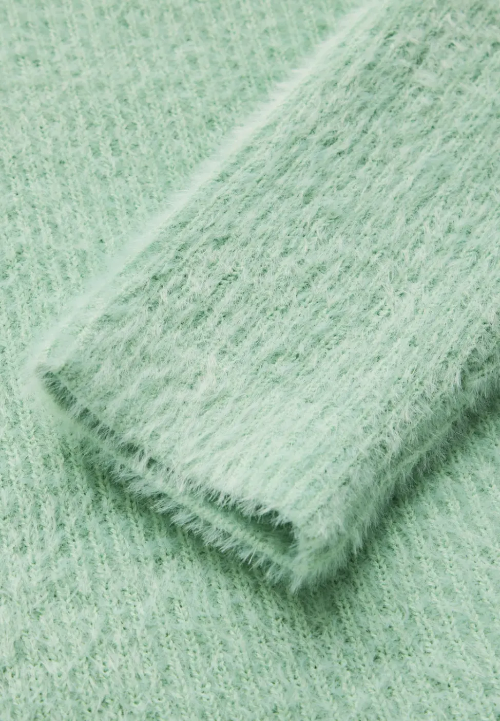 Pull en fil de plume