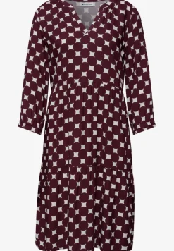 Robe à longueur de genou avec col fendu et imprimé