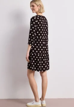 Robe à longueur de genou avec col fendu et imprimé