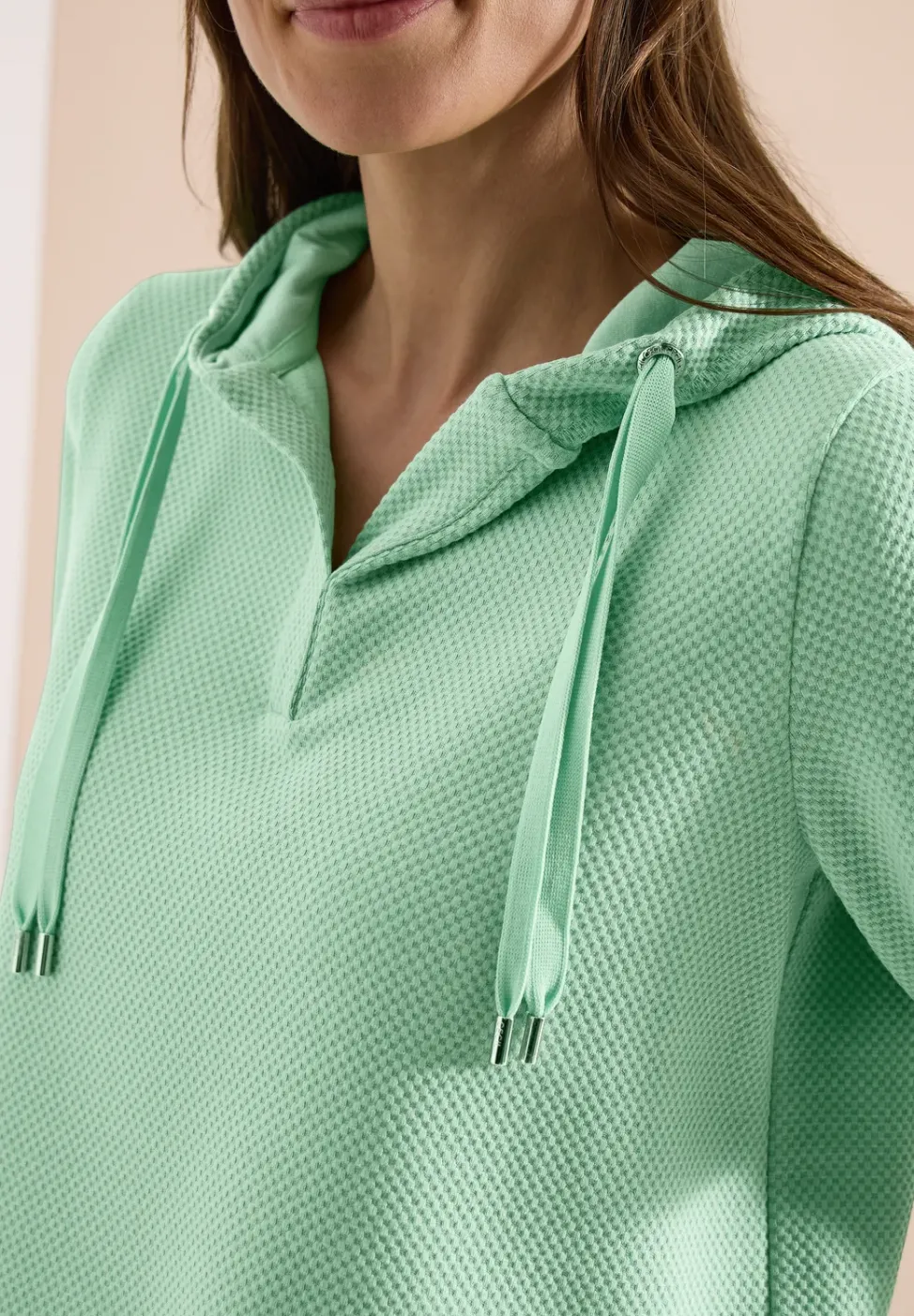 Sweat-shirt à capuche manches courtes
