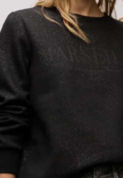 Sweat-shirt scintillant