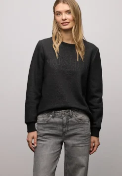 Sweat-shirt scintillant
